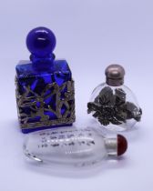 3 small perfume bottles