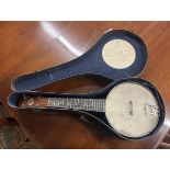 Banjo in case by John Grey and Sons of London