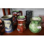 Collection of ceramic jugs to include a glass vase