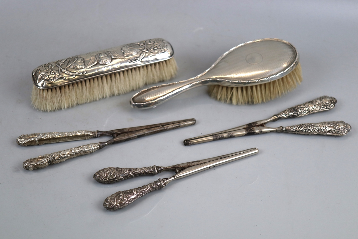 Silver handled brushes & glove stretchers