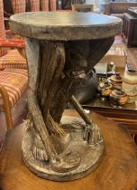 West African hardwood carved tribal stool with a caryatid