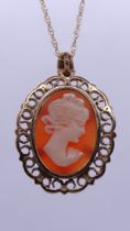 9ct gold mounted cameo on 9ct gold chain - Approx weight 4g