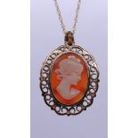 9ct gold mounted cameo on 9ct gold chain - Approx weight 4g