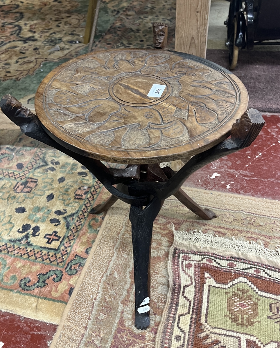 African carved folding tripod table