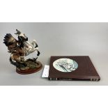 Native American on horse figurine together with a book on the Great Chiefs