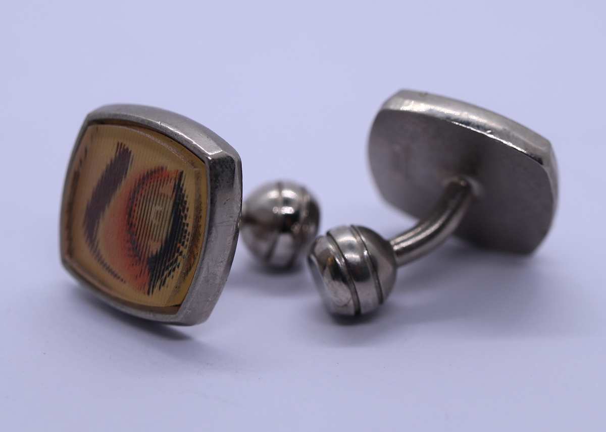 Pair of winking eye cufflinks