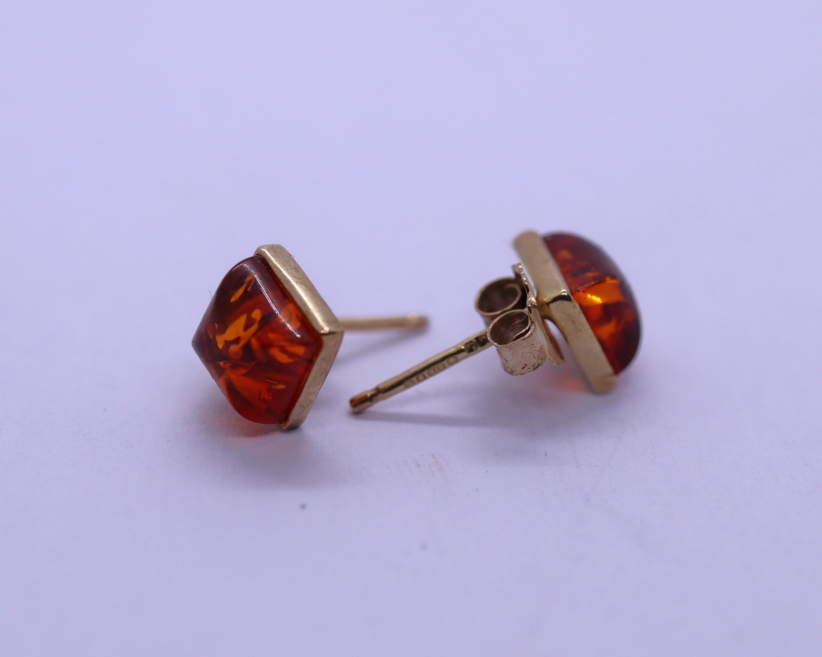 Pair of 9ct gold amber set earrings