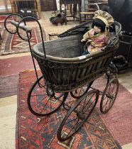 Vintage dolls pram with doll