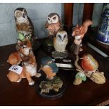 Collection of ceramic wildlife and dogs