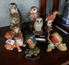 Collection of ceramic wildlife and dogs