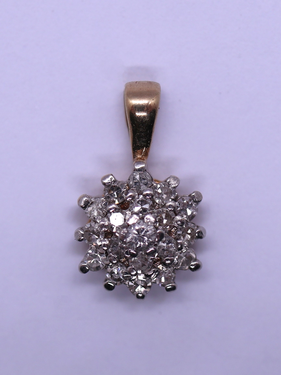 9ct gold diamond set pendent