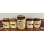 Salt glazed storage jars with cork tops