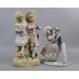 Lladro figure of boy and girl together with Staffordshire style figure of boy and girl