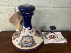 Large Pusser's rum US Navy and Marine Corps ships decanter together with a small Pusser's rum