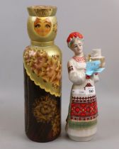 2 Russian figures, one with vodka inside