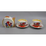 Wedgwood Clarice Cliff design Tea for Two Crocus teapot together with 2 cups and saucers