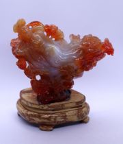 Carved cornelian agate statue