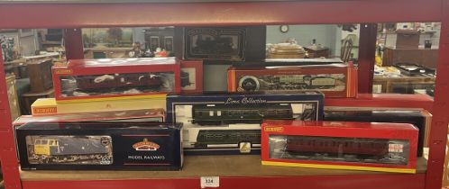 Collection of 00 gauge locomotives and carriages in original boxes