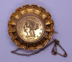 Gold mourning brooch set with a 22ct $2.5 coin dated 1873 - Gross weight 12.2g