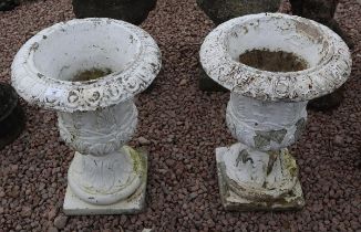 Pair of stone pedestal planters in white