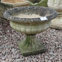 Small stone pedestal planter