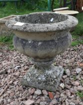 Small stone pedestal planter