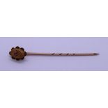 Cased 9ct gold stick pin set with ruby