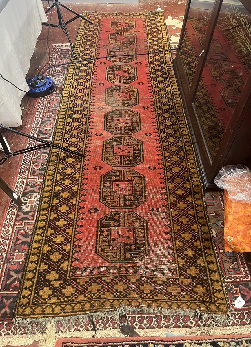 Large red patterned runner - Approx size: 300cm x 89cm