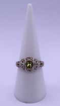 9ct gold peridot and diamond ring - Size N