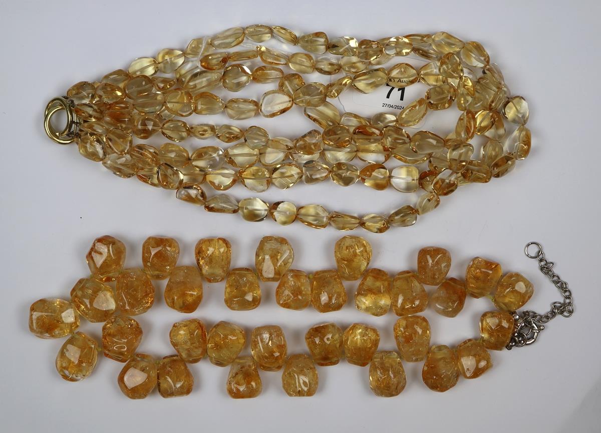 2 natural citrine necklaces one with a 18ct gold clasp & one with a silver clasp