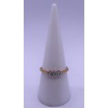 18ct 3 stone diamond ring - Size O