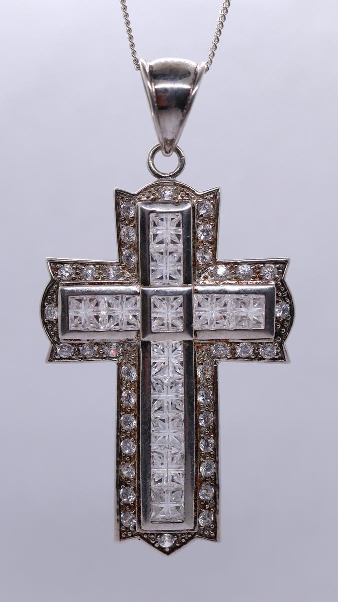 Large silver stone set cross on chain