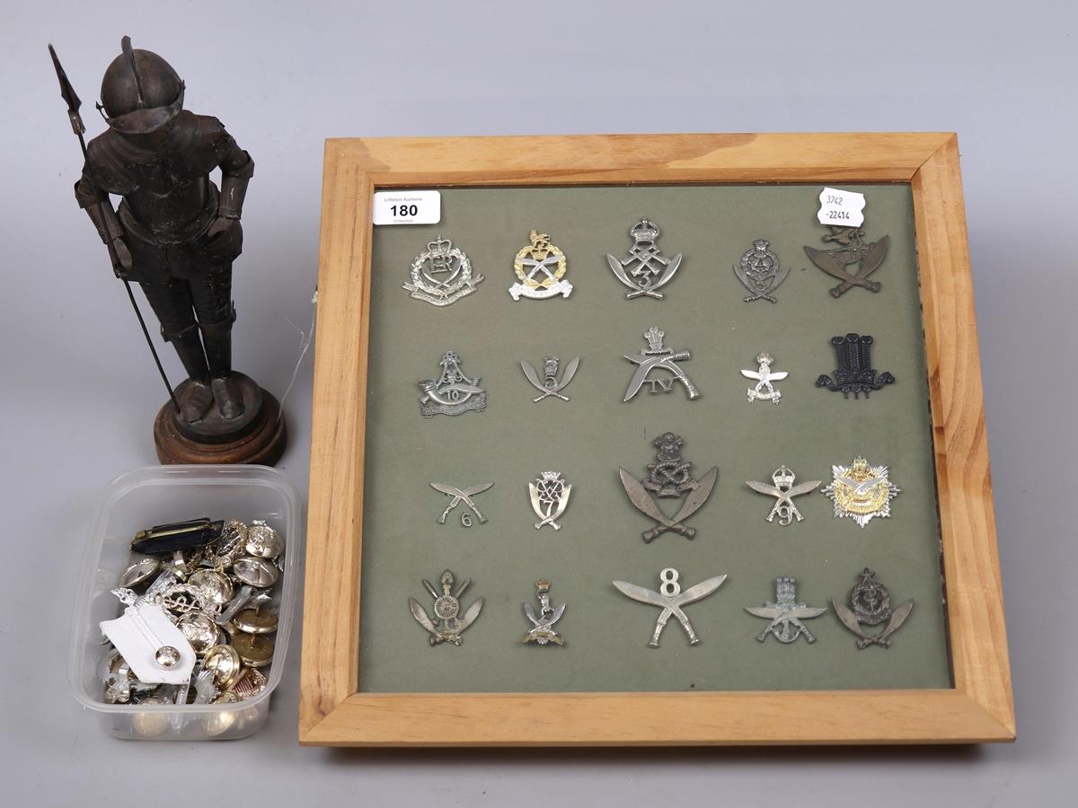 Collection of framed and loose military badges and buttons together with a model of a knights armour