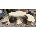 Large circular stone table with 2 benches