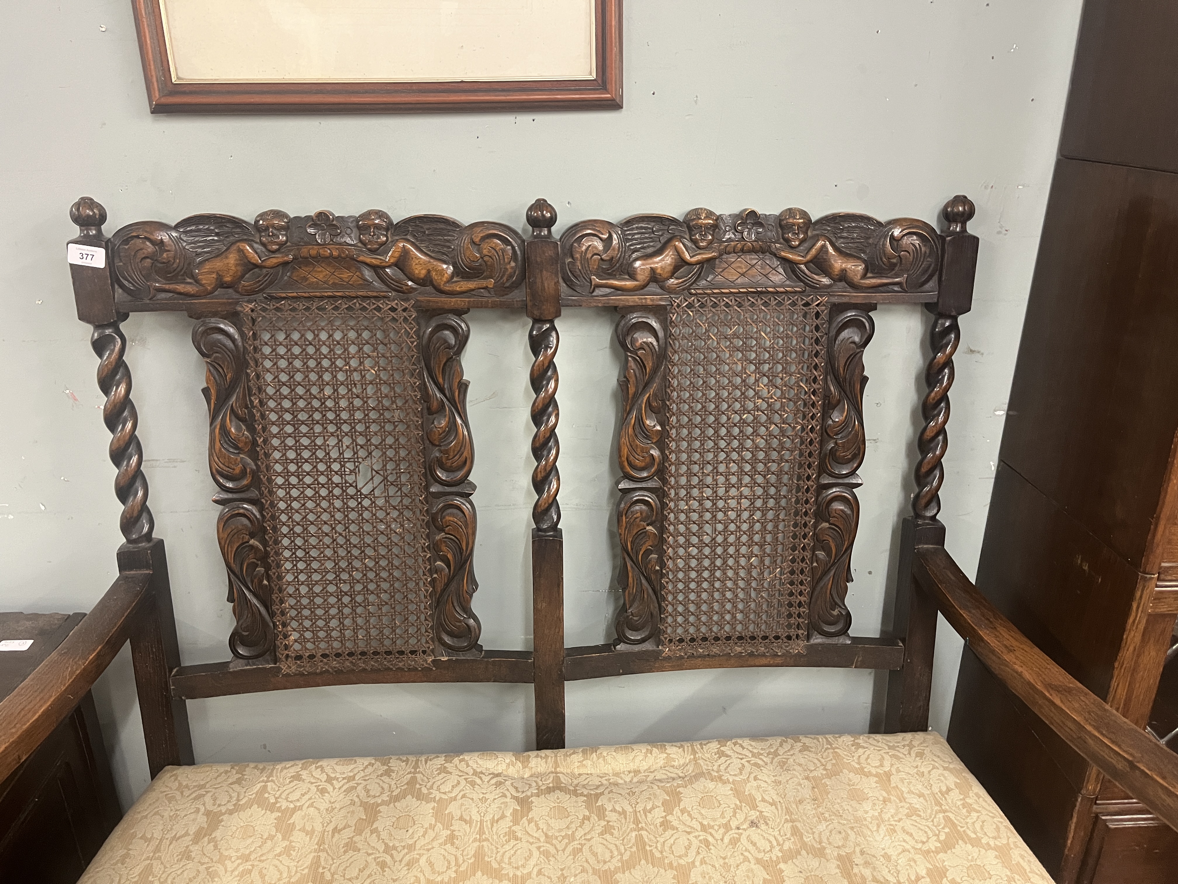 Late 19th to early 20th century Jacobean style carved rail hall bench with bergère back - Image 2 of 4
