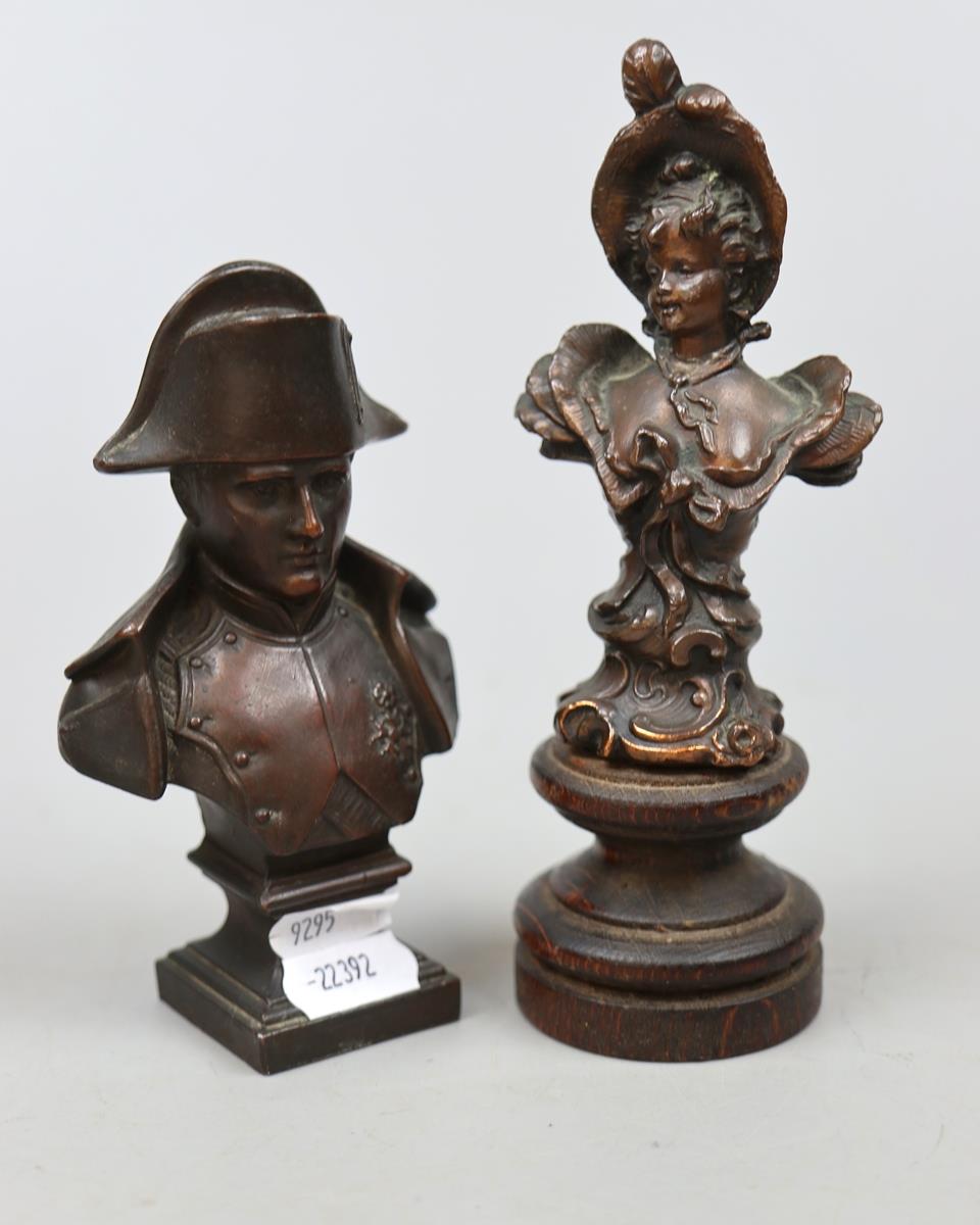 2 bronze busts 1 of Napoleon and the other of a young lady in a bonnet