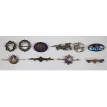 10 silver brooches