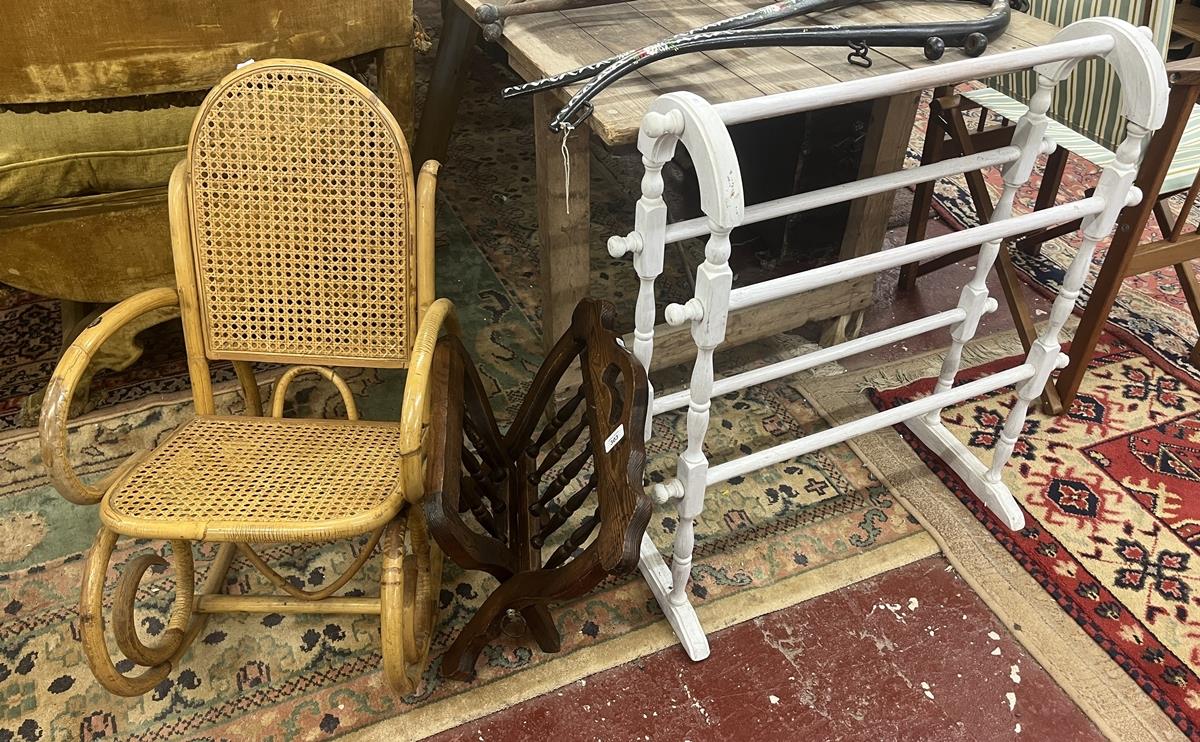 Wicker and bamboo childs rocking chair together with a folding magazine rack and painted towel rail