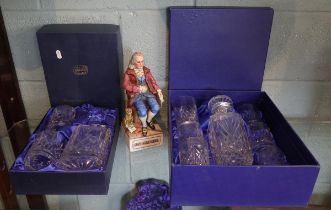 2 boxed crystal glasses together with Benjamin Franklin decanter