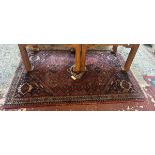 Small red hand woven rug - Approx size: 167cm x 116cm
