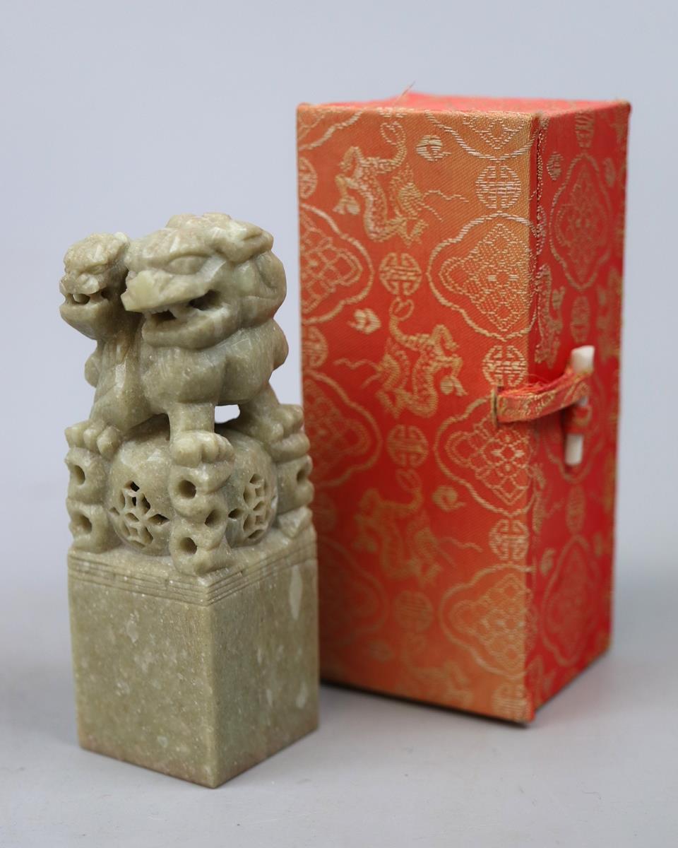 Carved soapstone peace stamp depicting Dogs of Foo