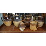 Collection of Doulton Lambeth stoneware jugs & tankards