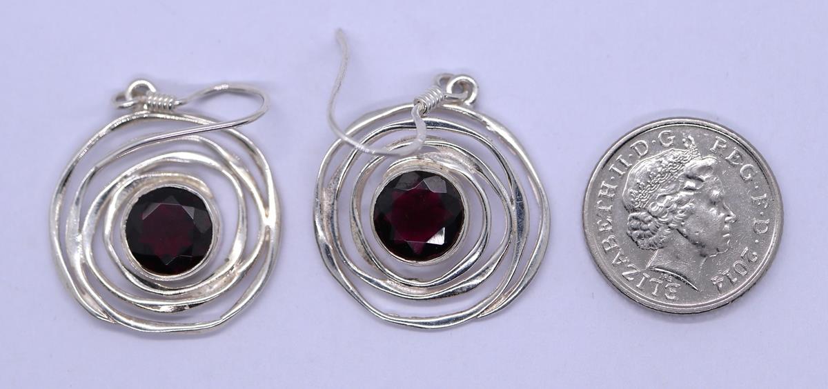 Pair of silver and garnet earrings