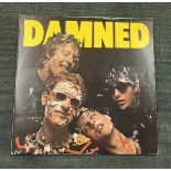 Damned self title album on Erratum label. Mispressed sleeve. Eddie and the Hotrods image used