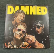 Damned self title album on Erratum label. Mispressed sleeve. Eddie and the Hotrods image used