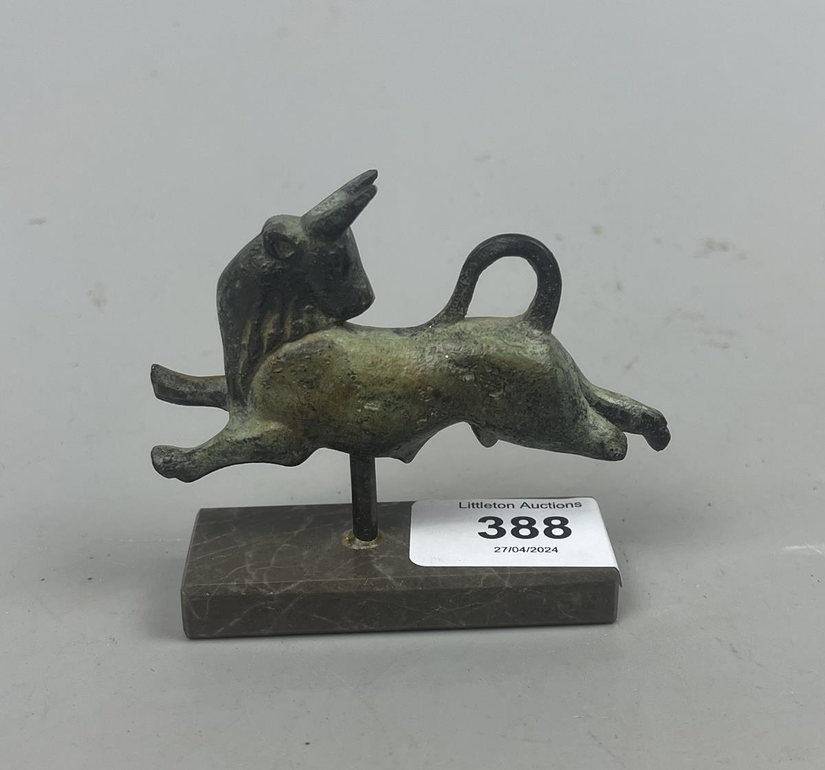 Small bronze bull on marble stand