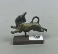 Small bronze bull on marble stand