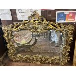 Large ornate gilt framed mirror