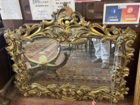 Large ornate gilt framed mirror