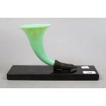 Green glass cornucopia vase on marble base